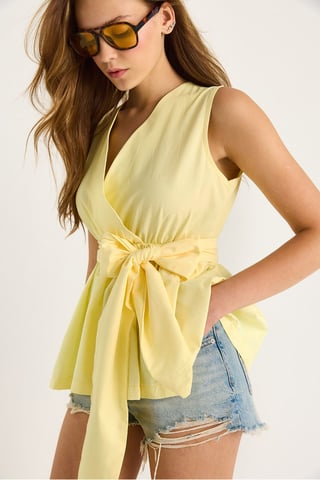 Long Sleeveless V-Neck Blouse with Tie Closure