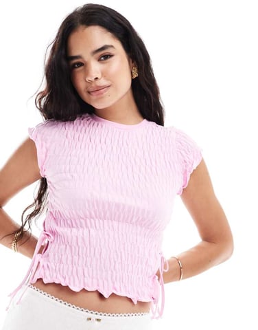 ASOS DESIGN textured short sleeve top with tie sides in pink