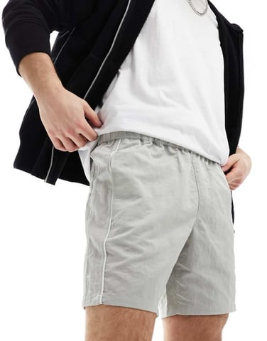ASOS DESIGN slim nylon shorts with piping detail in stone