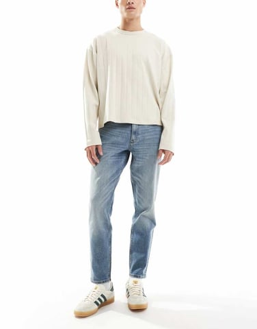 ASOS DESIGN stretch tapered jeans in mid wash blue