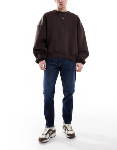 ASOS DESIGN stretch tapered jeans in dark wash