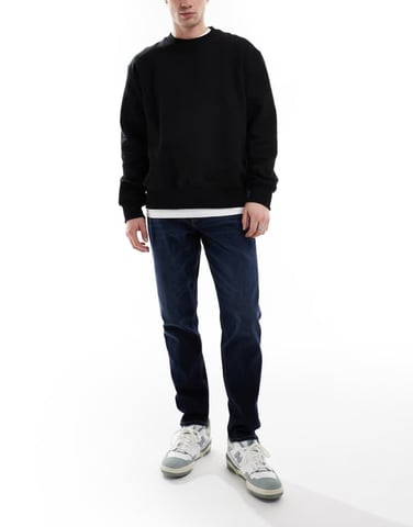 ASOS DESIGN stretch tapered jeans in dark wash