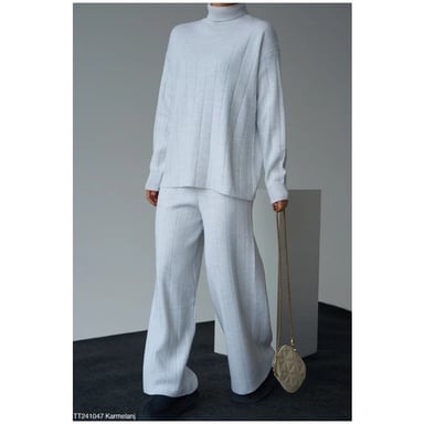 Oversized coltrui en uitlopende gebreide set