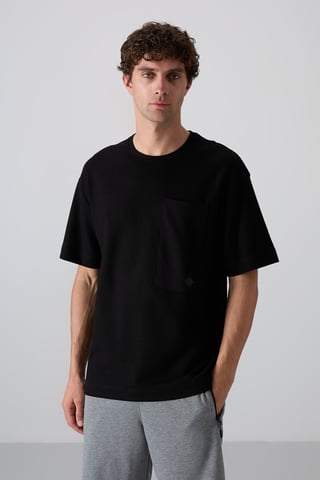 Överdimensionerad T-shirt i bomullsblandning med rund hals och ficka
