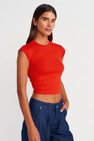 Kvinnors ärmlös crop-t-shirt