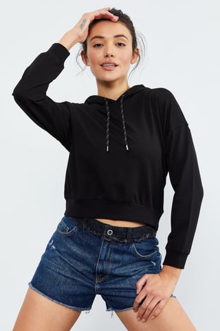 Avslappnad hoodie med knytning