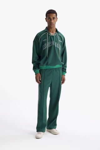 Dragsko-halsringning tryckt sweatshirt