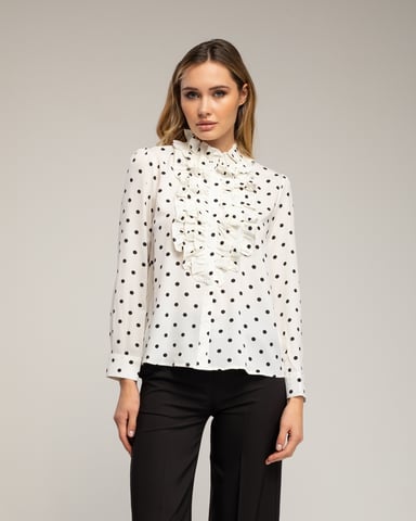 Polka dot blouse with ruffles on the chest