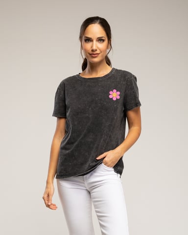 T-shirt with daisy print on the front and “have a good day” text on the back