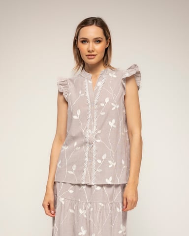 Striped blouse with embroidery and lace detailing with ruffles on the sleeves