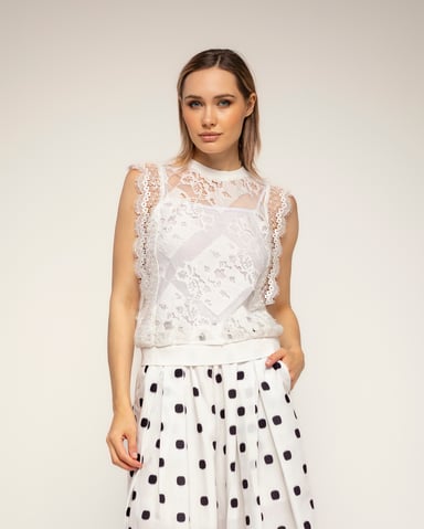 Sheer lace top with an elastic waistband