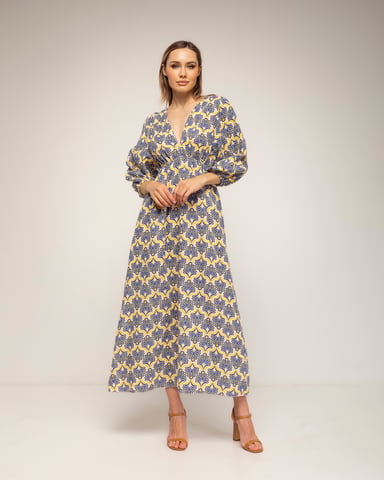 Printed dress with an elastic waistband, V-neck and V-back, and a tie-back closure