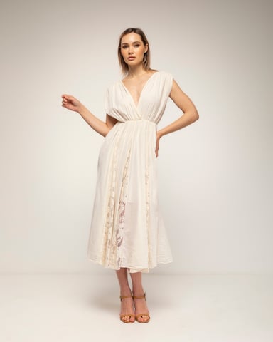 Midi dress with a flared skirt and lace details, featuring a V-neckline in the front and back