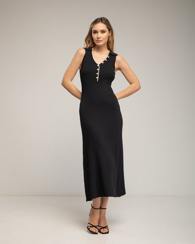 Long sleeveless pleated knit dress with buttons, collar, and topstitching detail on the neckline