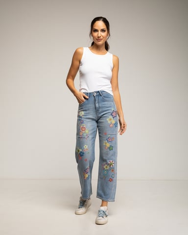 High-waisted straight jeans with flowers and designs painted on the front and back.