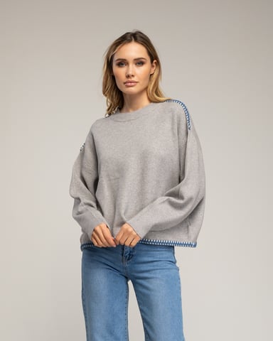 Oversized knit sweater with topstitching detail on the hem and shoulders