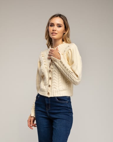 Crochet knit jacket with pom-pom and flower details