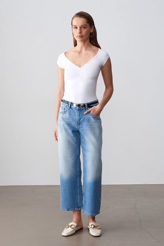 Lågmidjade vida caprijeans