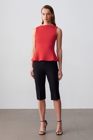 Fitted Sleeveless Peplum Blouse