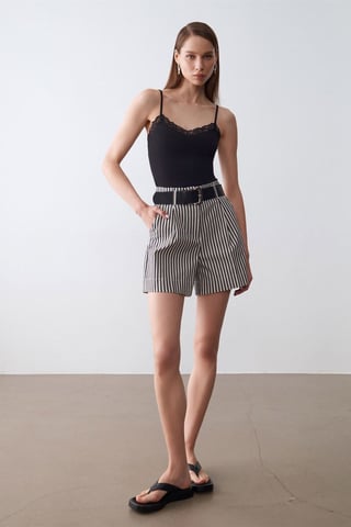 Slim Fit Ärmlös V-ringad Cami Blus