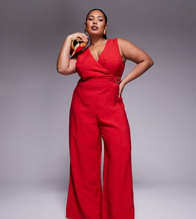ASOS DESIGN Curve wrap front cut out jumpsuit with buckle detail in red