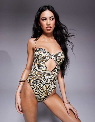 ASOS DESIGN Gia cut out underwired swimsuit in animal print