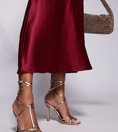 ASOS DESIGN Wide Fit Nobel caged high heeled sandals in gold