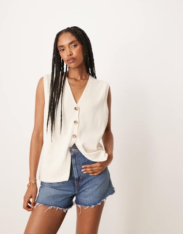 ASOS DESIGN clean knitted relaxed fit waistcoat in cream
