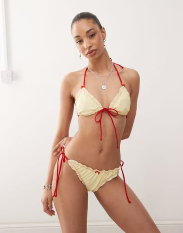 Reclaimed Vintage tie front triangle bikini top with frills in yellow and red