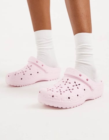 Crocs Classic floral cut out clogs in pink milk