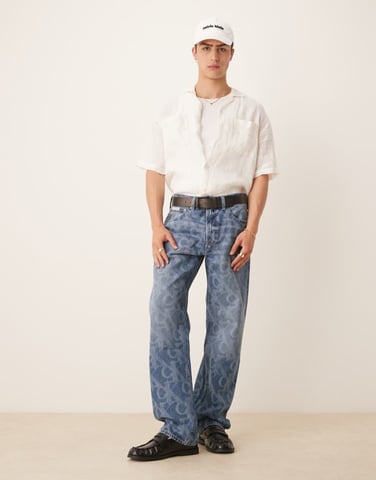 Calvin Klein Jeans 90s straight all over print jeans in mid wash