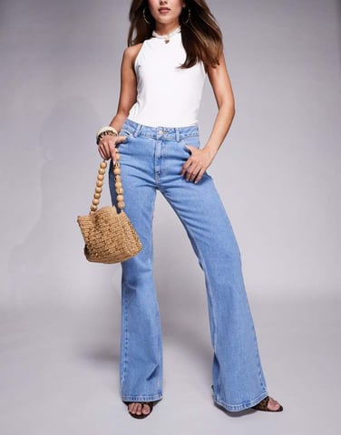ASOS DESIGN low rise flare jeans in clean midwash