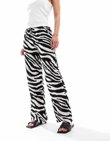 Vero Moda Easy tie waist wide leg trousers in zebra print
