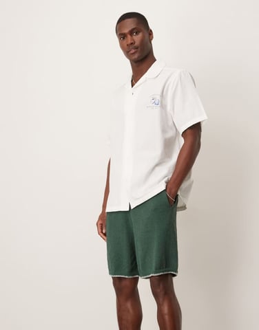 ASOS DESIGN oversized knitted shorts with blanket stitch in dark green