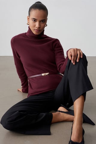 Kvinnors bälte turtleneck stickad tröja