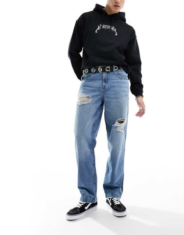 ASOS DESIGN baggy jeans med hål i mellanblå tvätt