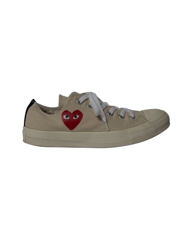 Comme Des Garcons Play x Converse Low Top Sneakers in Beige Canvas