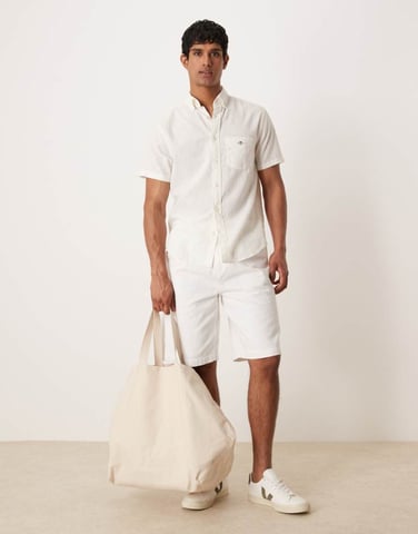 ASOS DESIGN long length denim jorts with pointed pleats in white