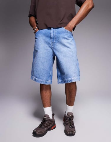 ASOS DESIGN long length denim jorts with twisted seam in light wash blue