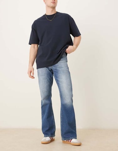 ASOS DESIGN vintage flare jeans in mid wash blue