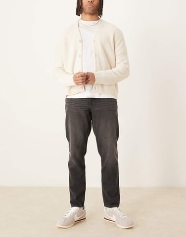 ASOS DESIGN tapered fit jeans in washed black