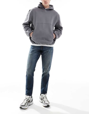 ASOS DESIGN stretch tapered in mid wash blue