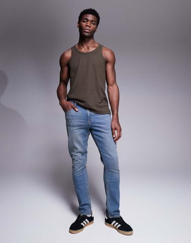 ASOS DESIGN slim fit jeans with tint in dark wash blue