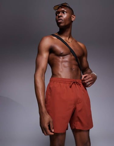 ASOS DESIGN swim shorts in mid length in rust