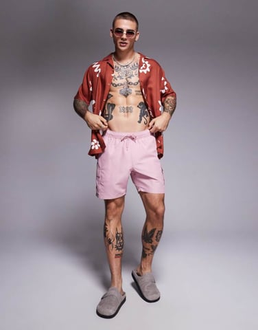 ASOS DESIGN swim shorts in mid length with cargo pockets in pink