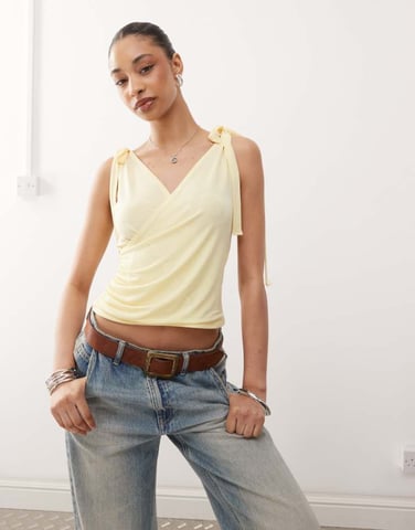 Reclaimed Vintage wrap front tank top with bow shoulder in buttermilk yellow