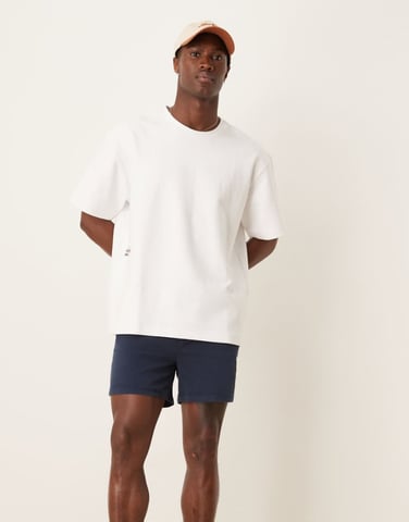 ASOS DESIGN kortare skinny chino shorts i marinblå