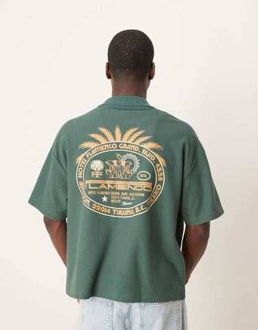 ASOS DESIGN heavyweight boxy oversized waffle texture polo with palm graphic in green