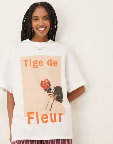 ASOS DESIGN oversized t-shirt with tige de fleur graphic in white