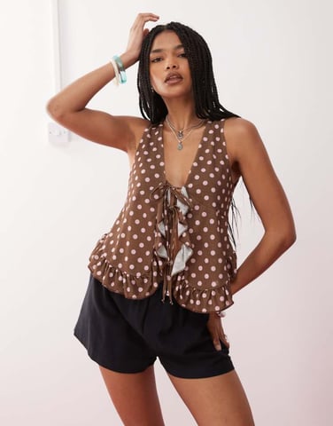 Reclaimed Vintage cheesecloth polka dot print ruffle tie front blouse in chocolate brown